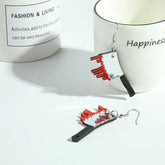 Halloween-themed earrings with a silver-plated bleeding knife design, crafted from acrylic for a striking look.